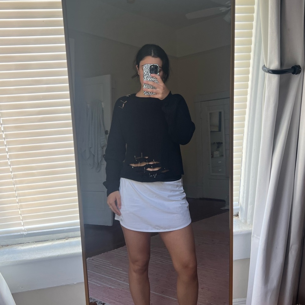 Black sweater with cutouts originally from LF